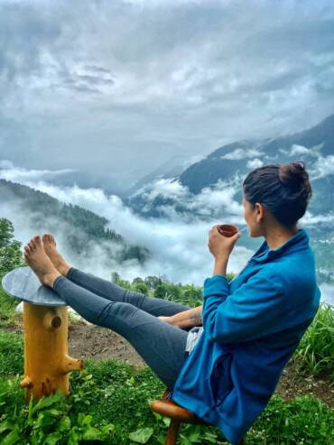 Traveler enjoying eco-friendly, romantic stay at GlampEco in Sethan, Manali