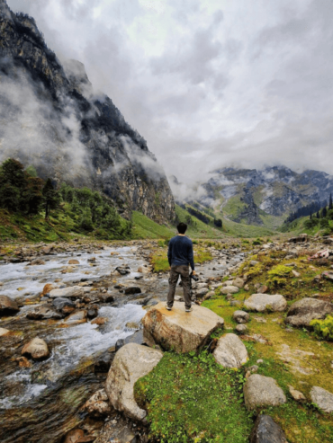 A traveler in nature on a day Hamta Pass hike with GlampEco