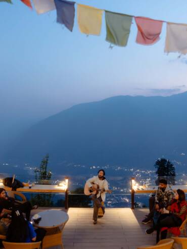 Live music sessions with mountain views at romantic GlampEco Glass Cafe in Manali