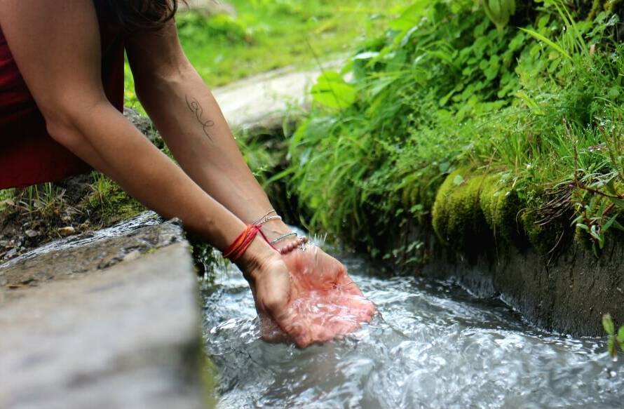 Fresh water from a water stream near GlampEco Manali