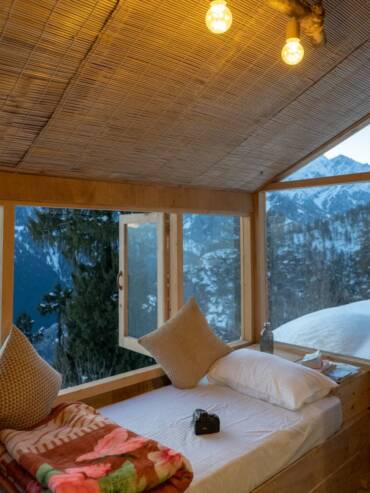 Scenic mountain views of the Manali landscape from GlampEco's cozy dormitory room