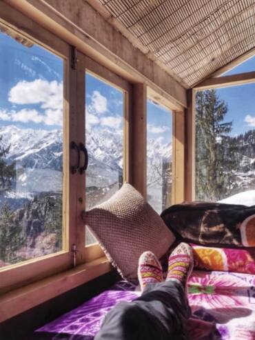 Mountain views from the GlampEco's mudhouse dorm room in Sethan, Manali