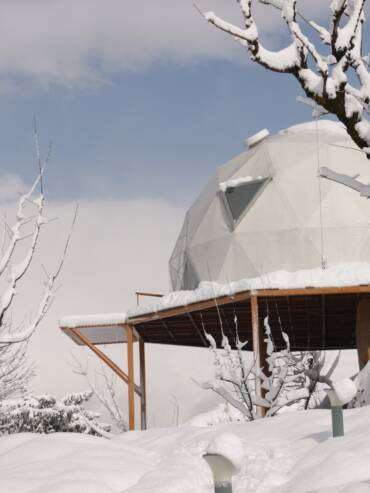 Luxury GlampEco glamping dome covered in snow